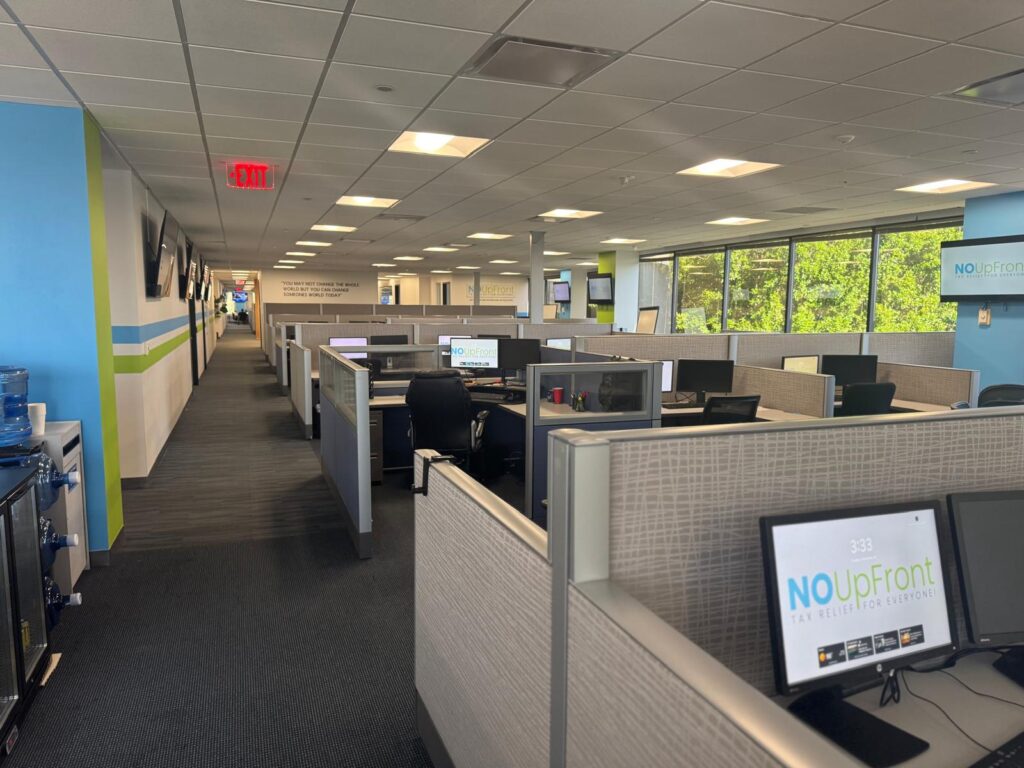 No UpFront tax relief staff welcoming clients